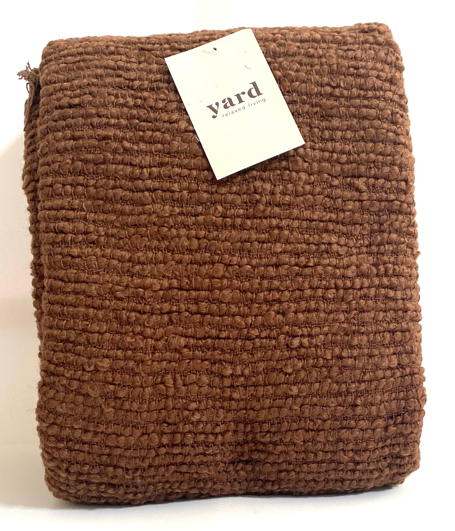 Brown textured blanket with a 'yard' tag on a white background